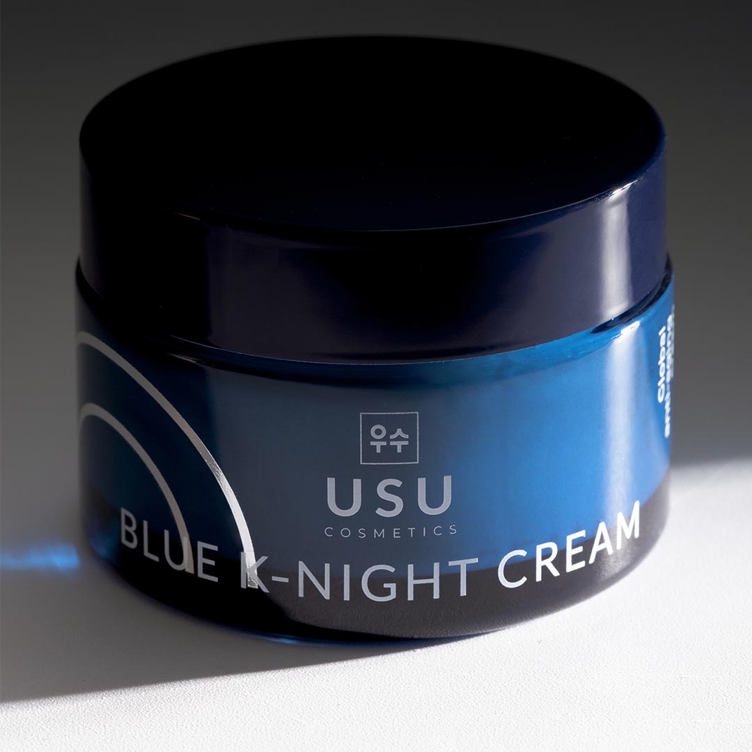Crema facial coreana en tarro azul de 50 ml que repara los daños de la luz azul en la piel